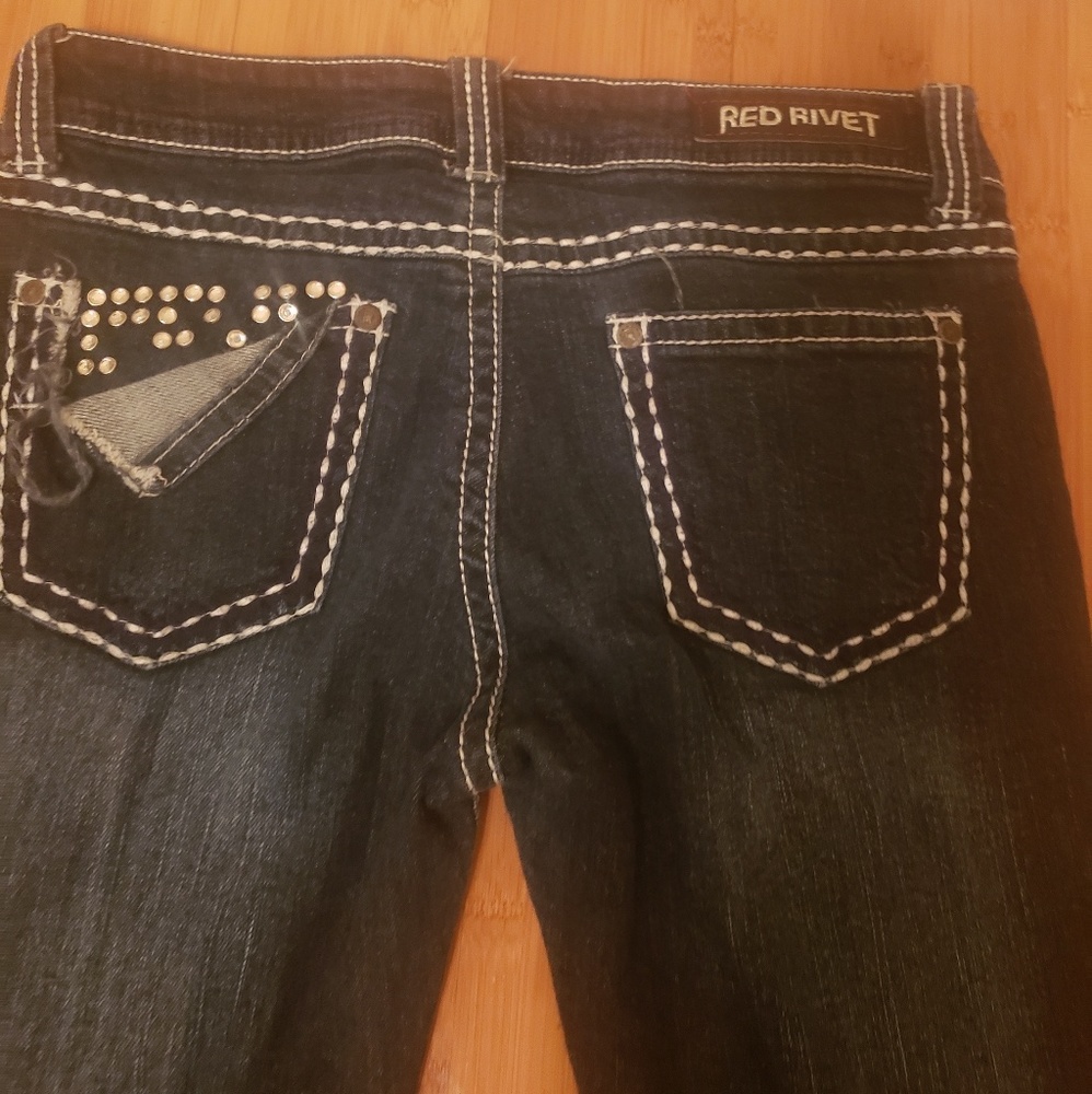 Red Rivet Skinny Jeans with White Stitching